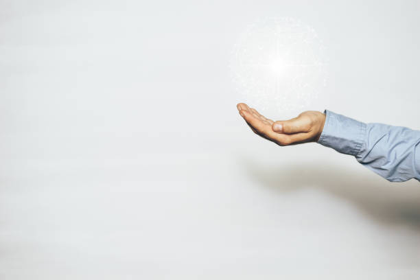 istock Man holding in palm Social connection technologies. Mixed media. 1155912094