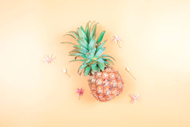 istock web banner freshness fruit and drink in summer season concept from minimal flat lay pineapple and tropical flower lay on pastel yellow blue background 1155912960