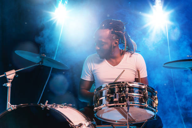istock Young african-american jazz musician playing drums 1155913092