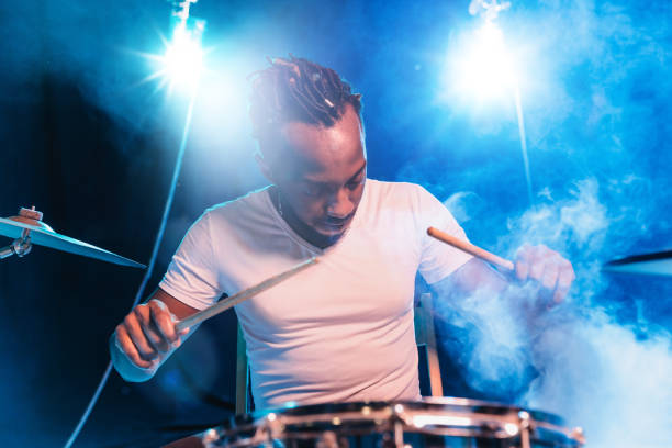 istock Young african-american jazz musician playing drums 1155913104