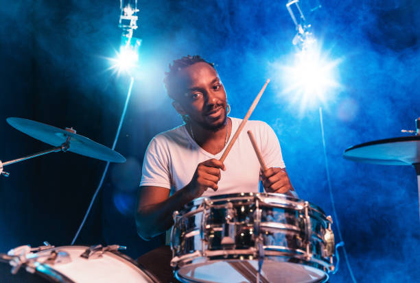 istock Young african-american jazz musician playing drums 1155913122