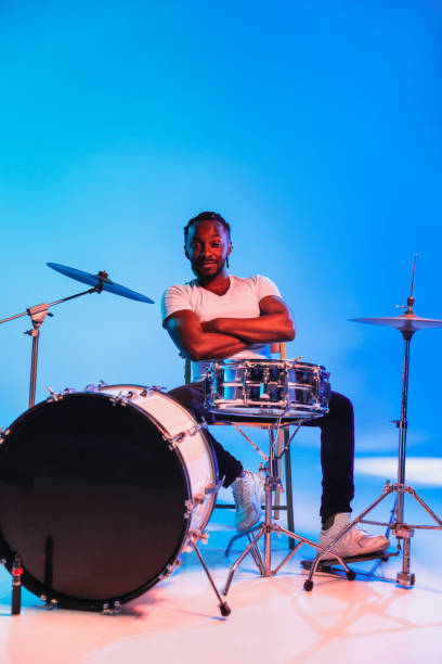 istock Young african-american jazz musician playing drums 1155913128