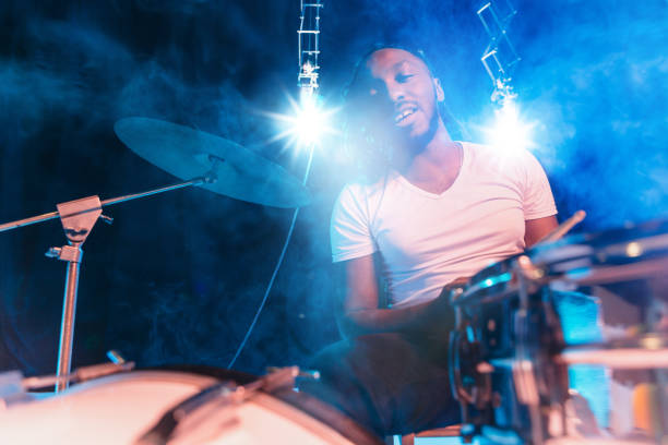 istock Young african-american jazz musician playing drums 1155913134
