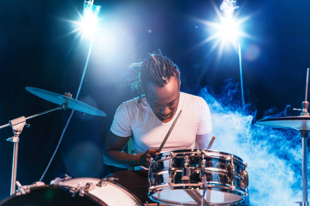 istock Young african-american jazz musician playing drums 1155913135
