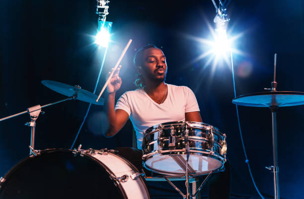 istock Young african-american jazz musician playing drums 1155913138