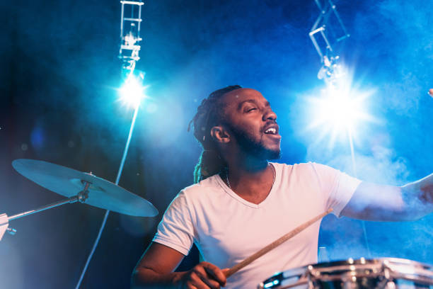 istock Young african-american jazz musician playing drums 1155913142