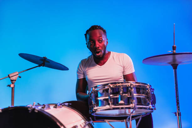 istock Young african-american jazz musician playing drums 1155913148