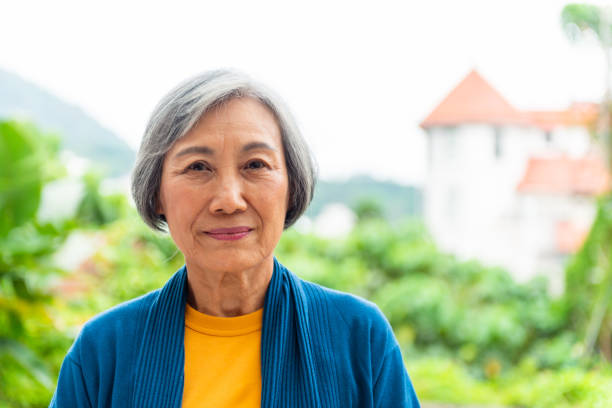 Elegant senior woman portrait A portait of a senior woman of Taiwanese ethnicity. chinese woman stock pictures, royalty-free photos & images