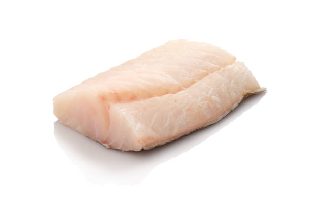 сырая рыба трески - cod fillet raw prepared fish стоковые фото и изображения