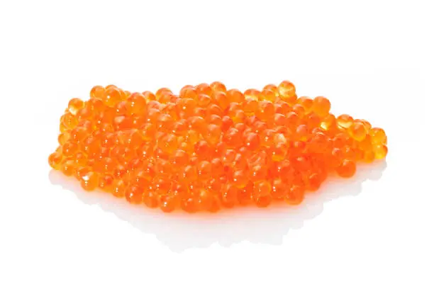 Orange trout roe caviar raw close-up