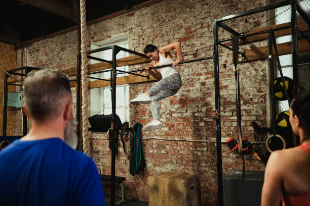 istock Woman Preforming Muscle-Ups 1155929509