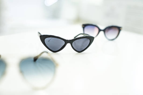 istock Women's sunglasses in a store. 1155929516