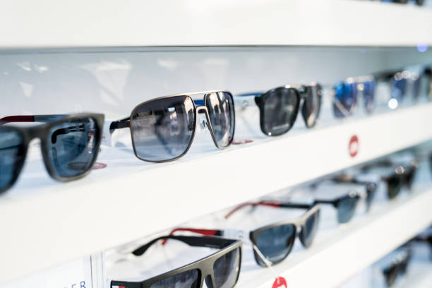 istock Men's sunglasses in a store. 1155930169