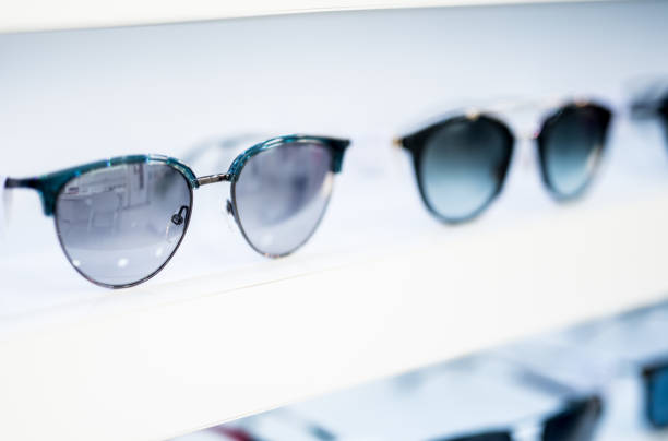 istock Women's sunglasses in a store. 1155930401