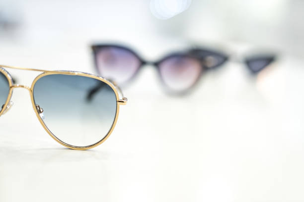 istock Women's sunglasses in a store. 1155930432
