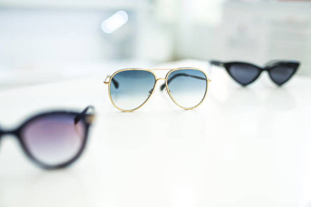istock Women's sunglasses in a store. 1155930654