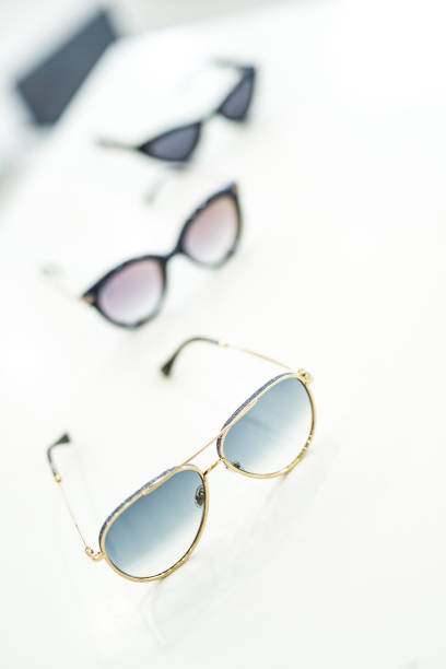 istock Women's sunglasses in a store. 1155930679