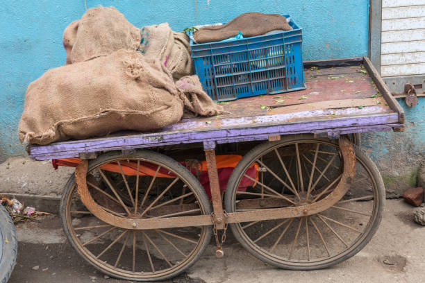 istock Old cart with jute bags, India 1155931503