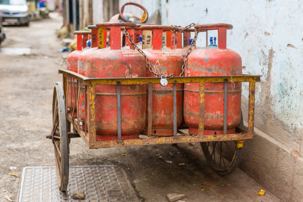 istock Old cart with gas bottles, India 1155931514