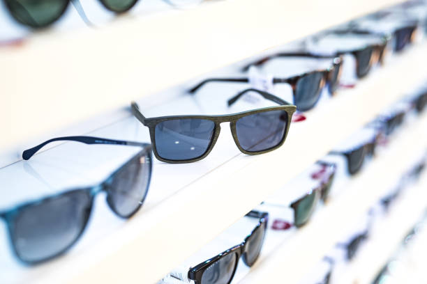 istock Men's sunglasses in a store. 1155931740