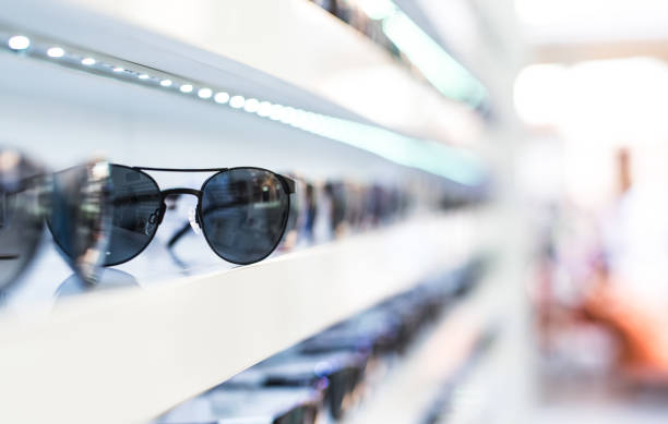 istock Women's sunglasses in a store. 1155933048