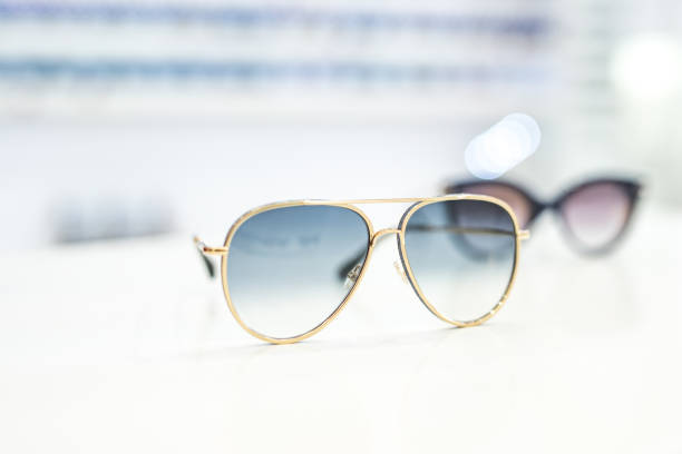 istock Women's sunglasses in a store. 1155933442