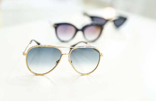 istock Women's sunglasses in a store. 1155933564