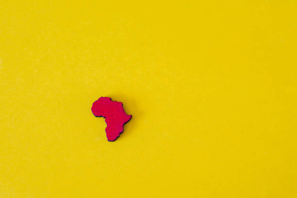 African continent cutout isolated against yellow background