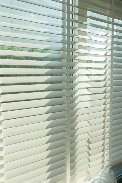 istock Close up of white window blinds 1155937152