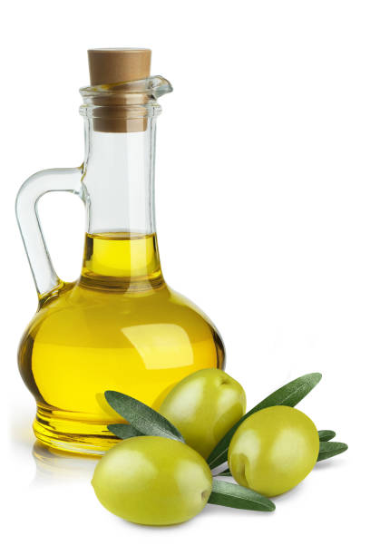 istock Olive oil and olives on white 1155941864