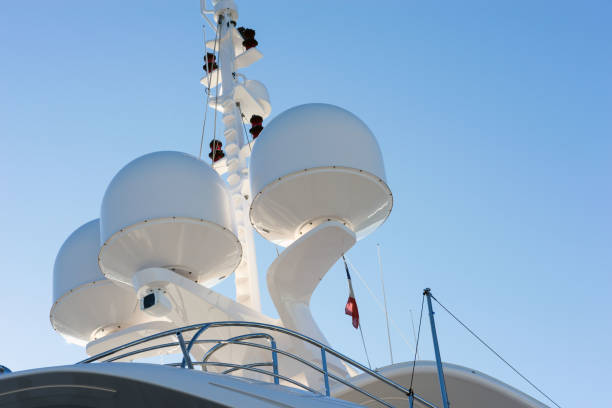 istock Radars on a white yacht against the blue sky. 1155942316