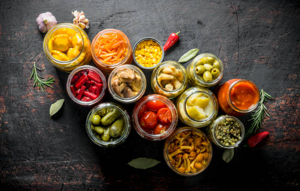 istock Various preserved vegetables in jars. 1155944731