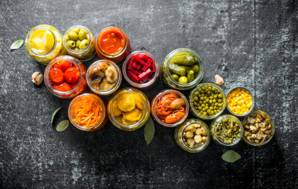 istock Preserved food in glass jars. 1155944890
