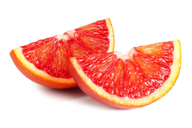 istock Slice of red blood orange isolated on white background 1155945279