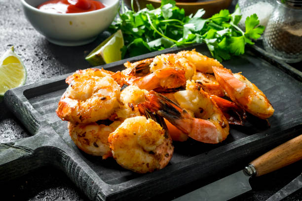 istock Delicious shrimps on the cutting Board. 1155946204