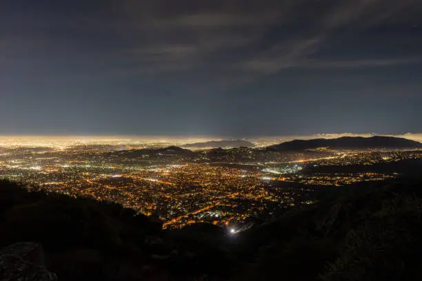Night view of Pasadena, Glendale and downtown Los Angeles from peak in the San Gabriel Mountains.
