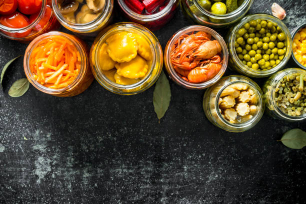 istock Preserved food in glass jars. 1155947473