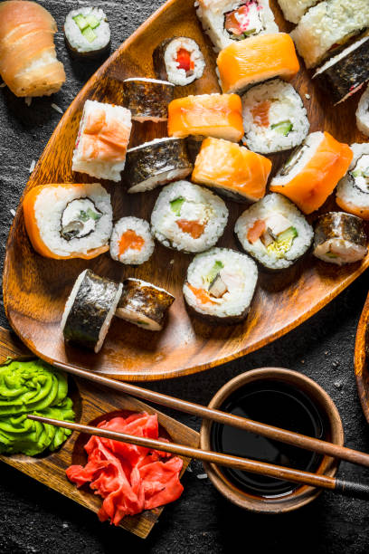 istock Pieces of delicious sushi, rolls and maki. 1155949463