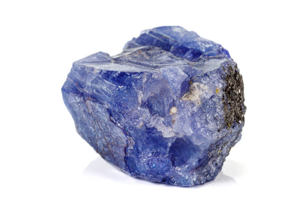 istock Macro blue tourmaline mineral stone on white background 1155950998