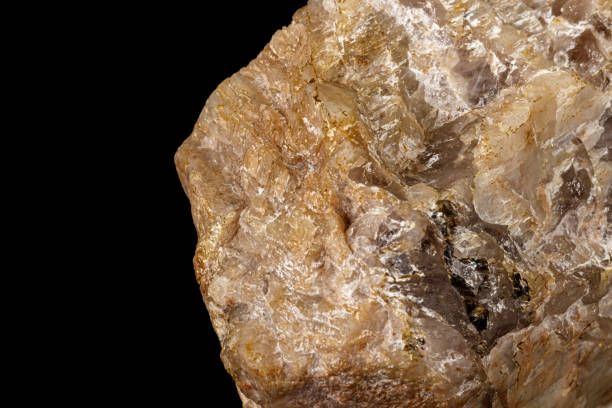 istock Macro of a stone Moonstone mineral on a black background 1155951020