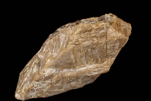 istock Macro of a stone Moonstone mineral on a black background 1155951150