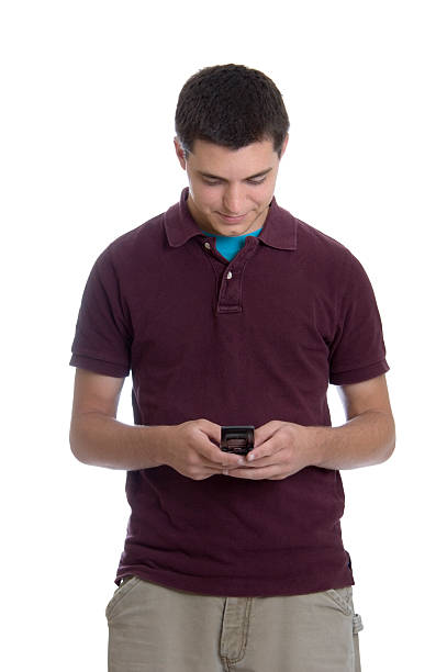 istock Teen Dialing Cell Phone 115595250