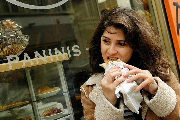 istock Woman Eating Panini 115595286