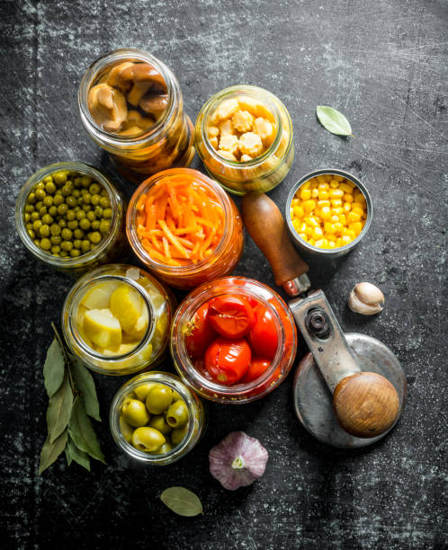 istock Pickled food in glass jars. 1155953308