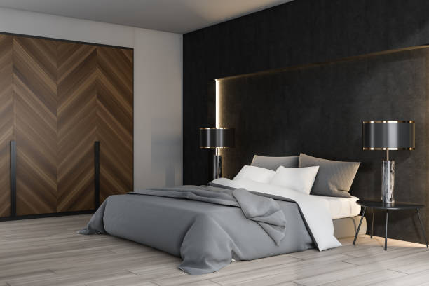 istock White, wooden and black master bedroom 1155956211