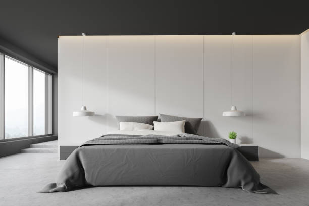 istock White and gray bedroom interior with stairs 1155956754