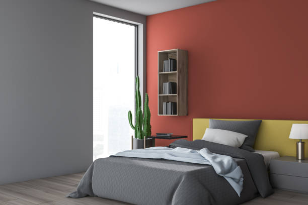 istock Gray and red bedroom corner with bookshelves 1155956767