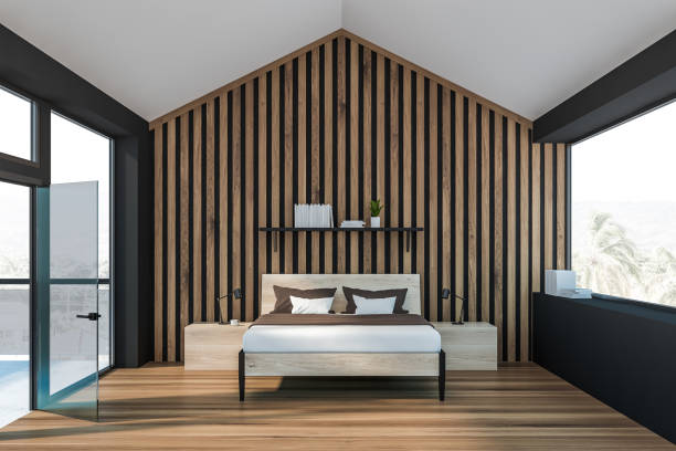 istock Gray attic master bedroom with balcony 1155958121