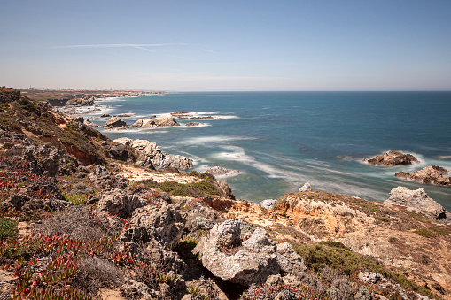 The Fishermen's Route on the Vicentina coast, situated in southwestern Portugal, is characterized by its rock formations and beaches with crystal clear waters.