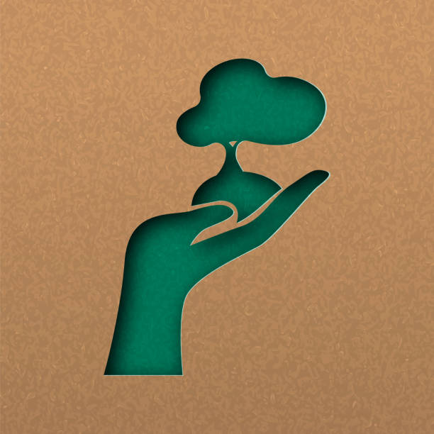Green papercut nature concept of hand with tree Papercut hand growing big tree. Green cutout concept in recycled paper for nature conservation or awareness. origami hand stock illustrations